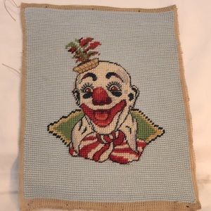 Hand needlepoint 10 x 7.75 inches. Clown face.